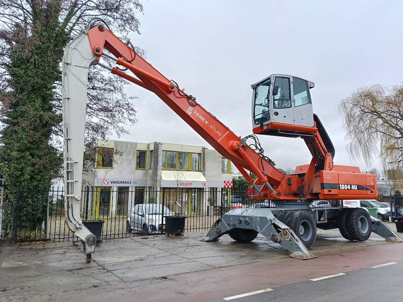 Atlas 1804 MI overslagkraan umslagbagger waste handler - Перегружатель: фото 1 Atlas 1804 MI overslagkraan umslagbagger waste handler - Перегружатель: фото 1