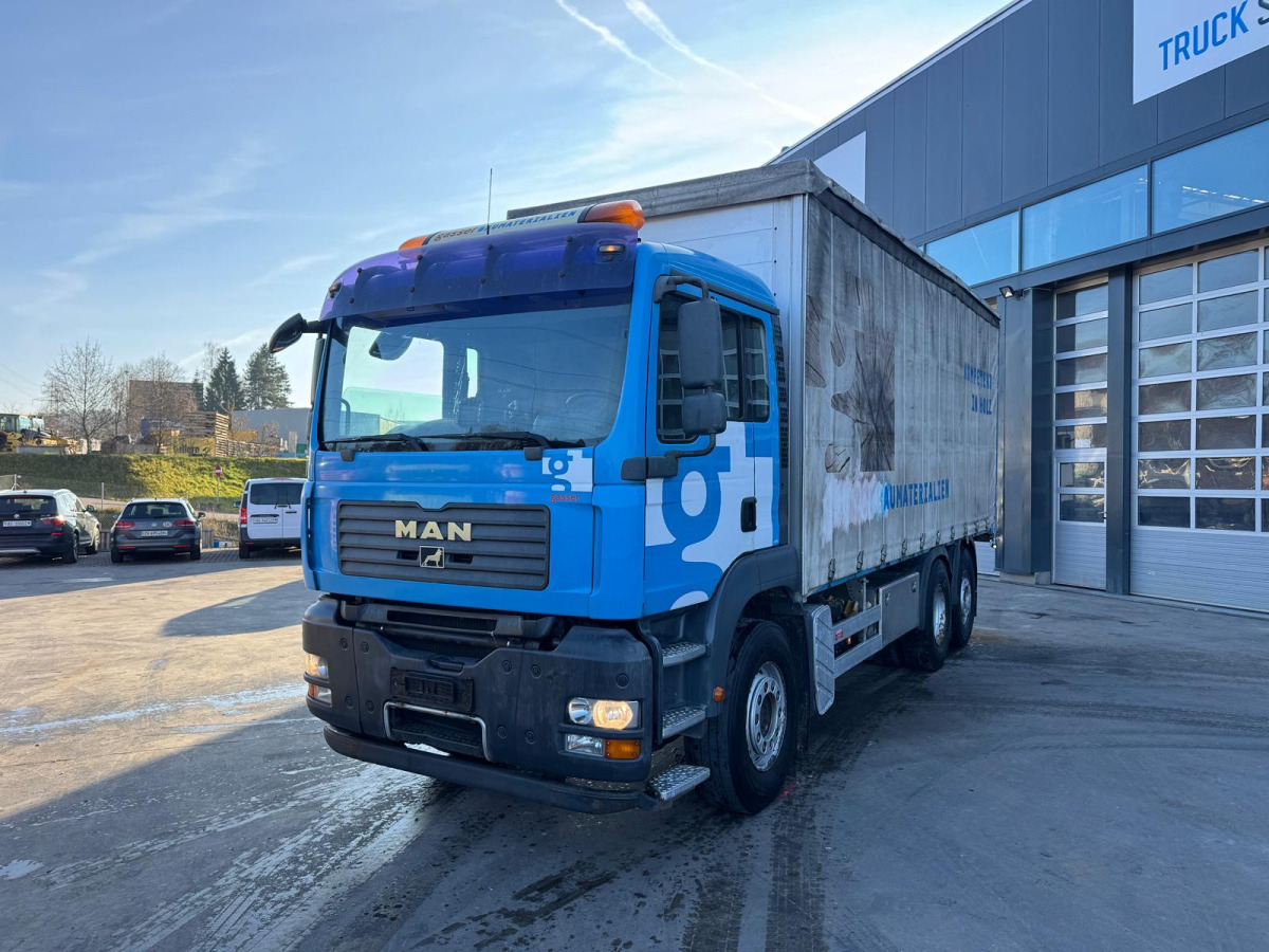 MAN TGA 26.440 6x2 - Тентованный грузовик: фото 1 MAN TGA 26.440 6x2 - Тентованный грузовик: фото 1