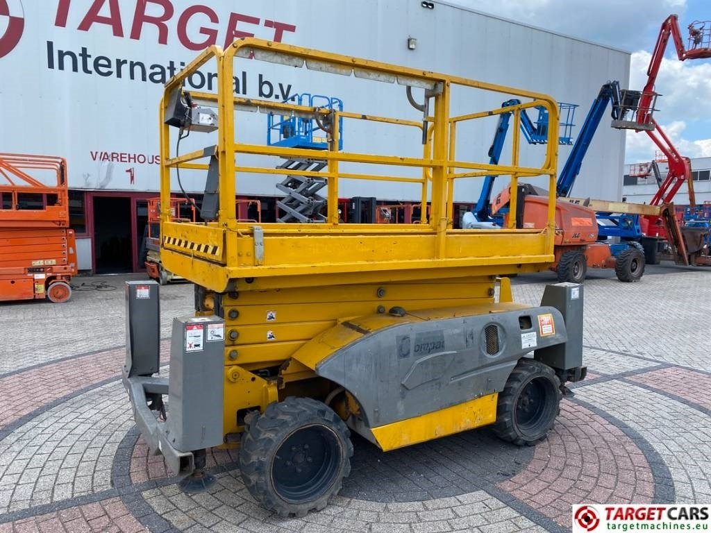 Haulotte Compact 12DX Diesel 4x4 Scissor Work Lift 1206cm - Ножничный подъемник: фото 1 Haulotte Compact 12DX Diesel 4x4 Scissor Work Lift 1206cm - Ножничный подъемник: фото 1