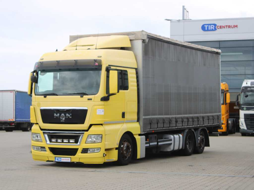 MAN TGX 24.440, EURO 5EEV, 6X2, AIR SUSPENSION - Тентованный грузовик: фото 1 MAN TGX 24.440, EURO 5EEV, 6X2, AIR SUSPENSION - Тентованный грузовик: фото 1