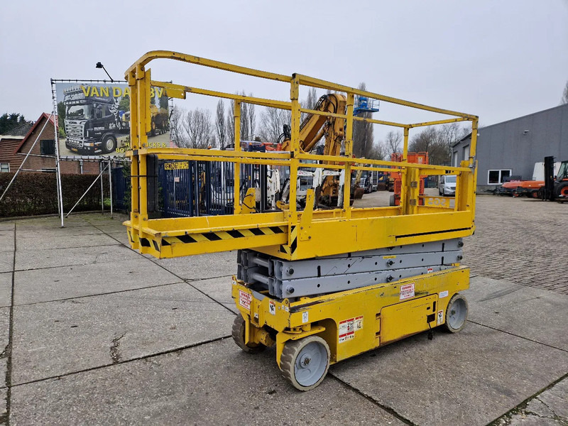 Ножничный подъемник Genie GS2032 elektrisch werkhoogte 8m. met keuring: фото 1