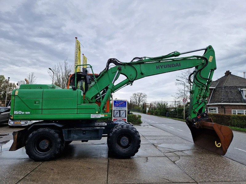 Hyundai Robex 160W-9A met 6-cilinder Cummins motor - Колёсный экскаватор: фото 2 Hyundai Robex 160W-9A met 6-cilinder Cummins motor - Колёсный экскаватор: фото 2