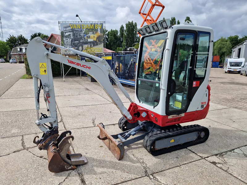Takeuchi TB216 met 2089 uur - Мини-экскаватор: фото 1 Takeuchi TB216 met 2089 uur - Мини-экскаватор: фото 1