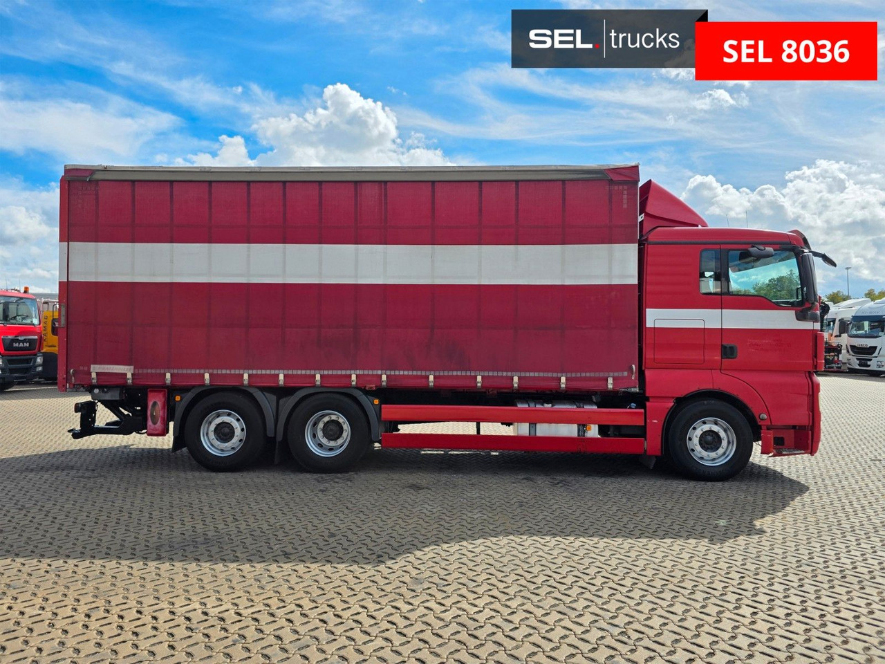 MAN TGX 26.360 6X2-2 LL / Intarder / Ldbw /Lenkachse - Тентованный грузовик: фото 4 MAN TGX 26.360 6X2-2 LL / Intarder / Ldbw /Lenkachse - Тентованный грузовик: фото 4