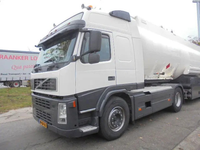 Volvo FM 400 GLOBETROTTER ADR NL TRUCK +TANK TRAILER - Тягач: фото 1 Volvo FM 400 GLOBETROTTER ADR NL TRUCK +TANK TRAILER - Тягач: фото 1