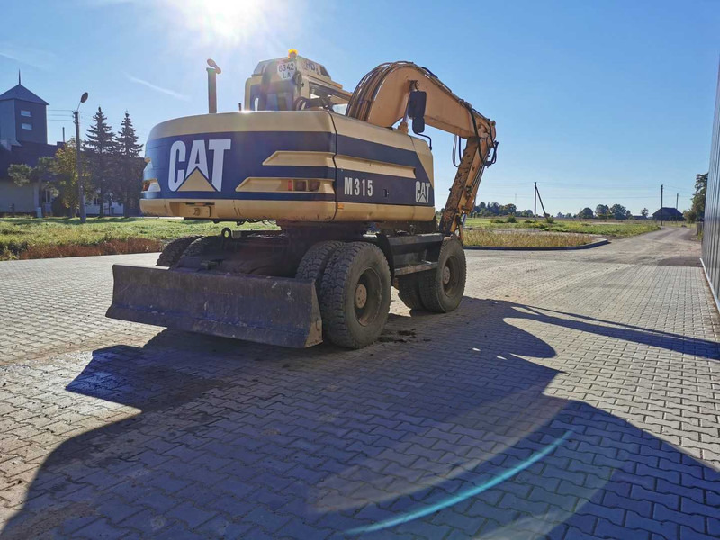 Caterpillar M315 wheel excavator - Колёсный экскаватор: фото 5 Caterpillar M315 wheel excavator - Колёсный экскаватор: фото 5
