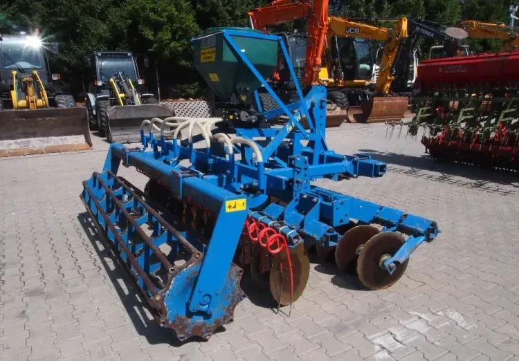 Agregat uprawowo-siewny Rabe Werk 2011 3m brona talerzowa z siewnikiem do poplonów - Посевной комплекс: фото 5 Agregat uprawowo-siewny Rabe Werk 2011 3m brona talerzowa z siewnikiem do poplonów - Посевной комплекс: фото 5