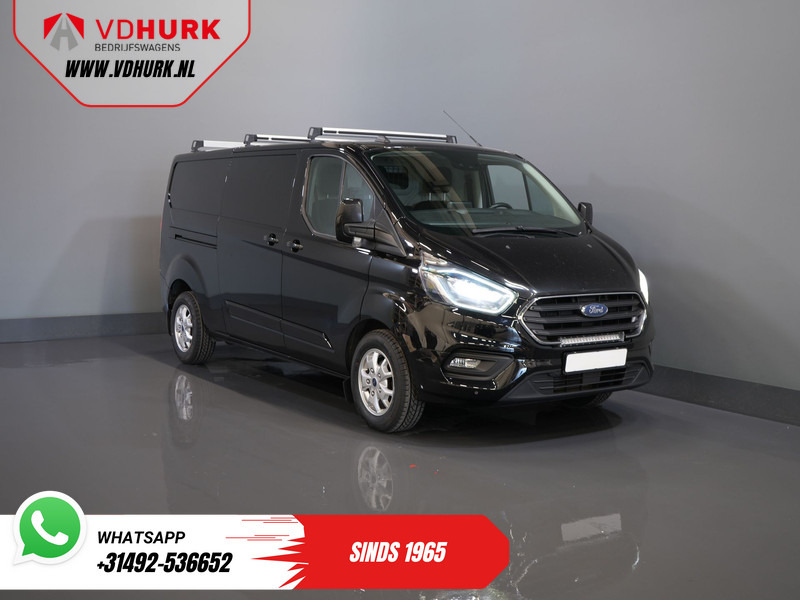 Ford Transit Custom 2.0 TDCI 130 pk Aut. L2 Bi-Xenon/ Stoelverw./ Standkachel/ Camera/ Cruise/ LMV/ PDC - Цельнометаллический фургон: фото 1 Ford Transit Custom 2.0 TDCI 130 pk Aut. L2 Bi-Xenon/ Stoelverw./ Standkachel/ Camera/ Cruise/ LMV/ PDC - Цельнометаллический фургон: фото 1