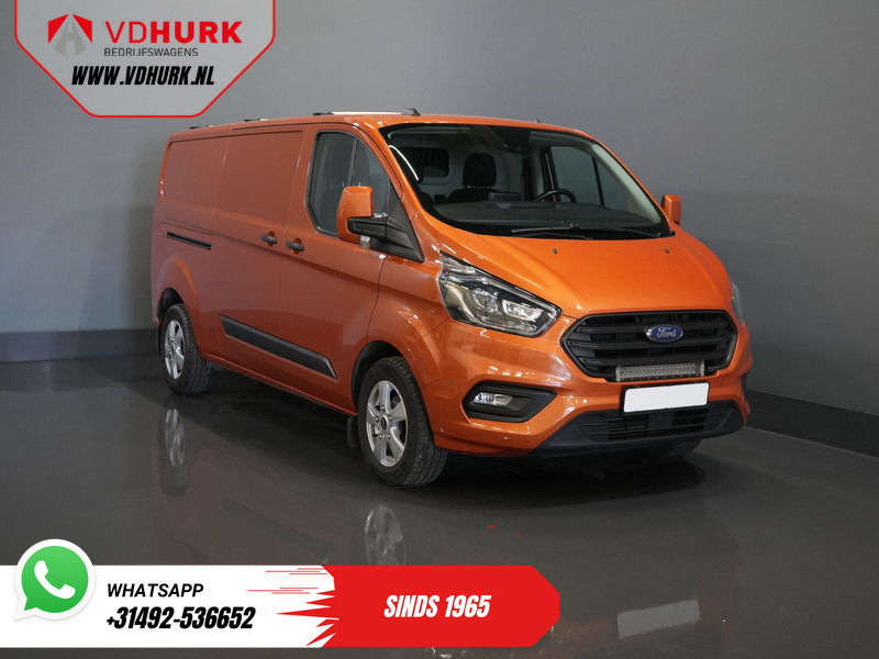 Ford Transit Custom 300 2.0 TDCI 130 pk Aut. L2 Limited BPM VRIJ! Bi-Xenon/ 2x Schuifdeur/ Standkachel/ Stoelverw./ Carplay/ Camera/ PDC/ LMV/ Cruis - Цельнометаллический фургон: фото 1 Ford Transit Custom 300 2.0 TDCI 130 pk Aut. L2 Limited BPM VRIJ! Bi-Xenon/ 2x Schuifdeur/ Standkachel/ Stoelverw./ Carplay/ Camera/ PDC/ LMV/ Cruis - Цельнометаллический фургон: фото 1