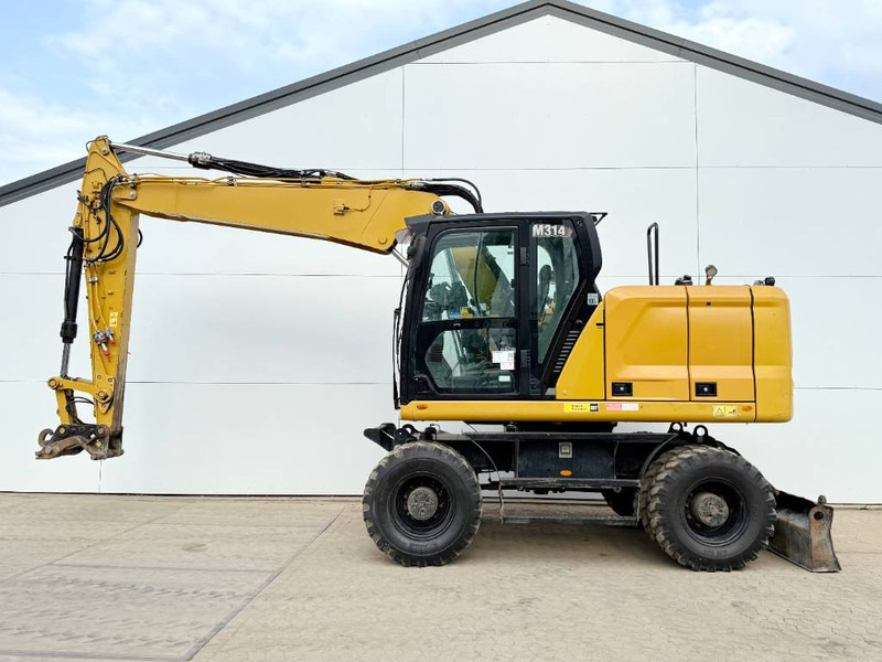 Cat M314 next gen - Triple Boom / Automatic Greasing - Колёсный экскаватор: фото 1 Cat M314 next gen - Triple Boom / Automatic Greasing - Колёсный экскаватор: фото 1