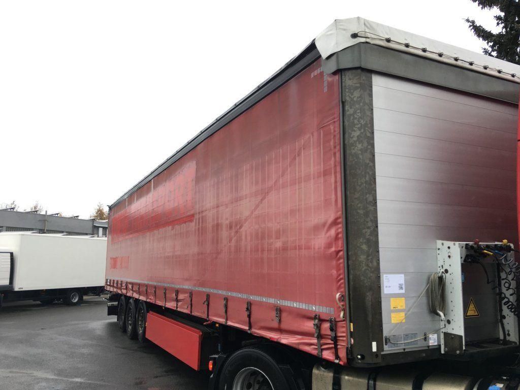 Schmitz Cargobull SCB*S3T standard/lifting roof/Hubdach 2,70-2,85m - Тентованный полуприцеп: фото 1 Schmitz Cargobull SCB*S3T standard/lifting roof/Hubdach 2,70-2,85m - Тентованный полуприцеп: фото 1