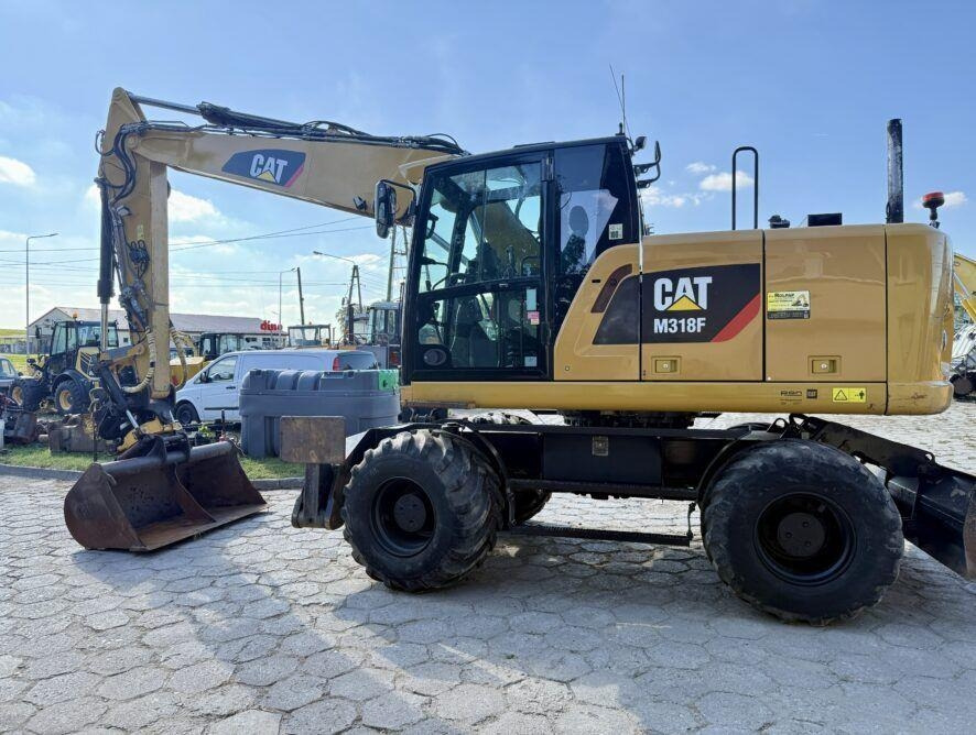 CAT M318F - Колёсный экскаватор: фото 1 CAT M318F - Колёсный экскаватор: фото 1
