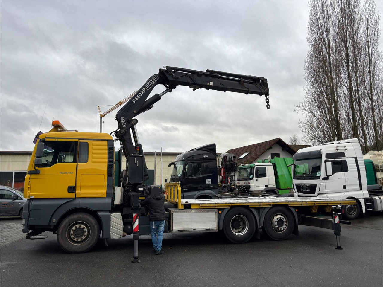 MAN TGA 26.440 FASSI F450AXP Containerauf./Lenkachse - Автоманипулятор: фото 2 MAN TGA 26.440 FASSI F450AXP Containerauf./Lenkachse - Автоманипулятор: фото 2