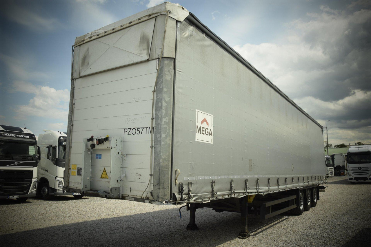 Schmitz Cargobull SCS24/L Varios - Тентованный полуприцеп: фото 1 Schmitz Cargobull SCS24/L Varios - Тентованный полуприцеп: фото 1