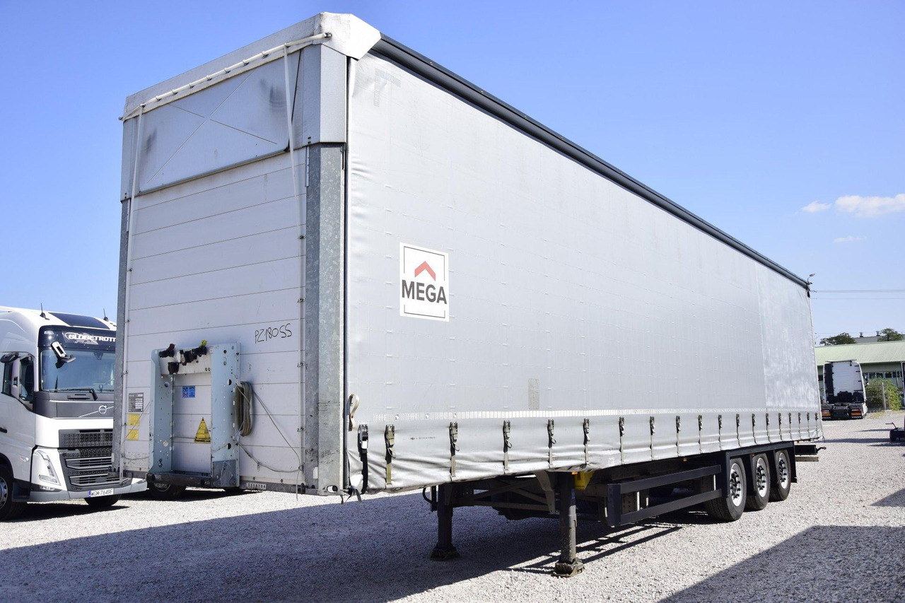 Schmitz Cargobull SCS24/L Varios - Тентованный полуприцеп: фото 1 Schmitz Cargobull SCS24/L Varios - Тентованный полуприцеп: фото 1