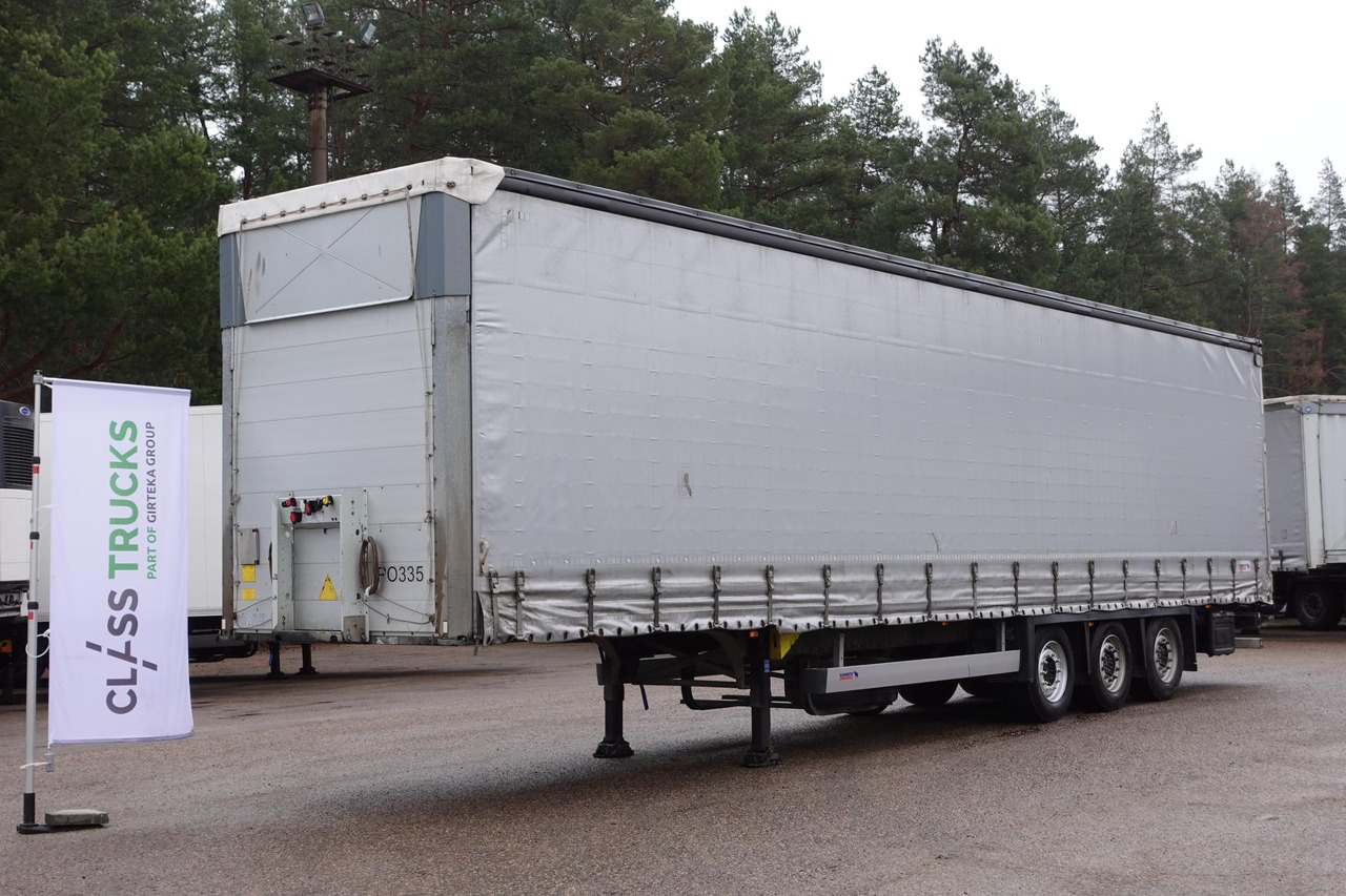Schmitz Cargobull SCS24/L Varios - Тентованный полуприцеп: фото 1 Schmitz Cargobull SCS24/L Varios - Тентованный полуприцеп: фото 1