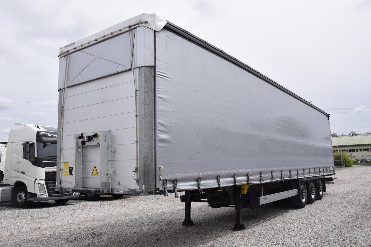 Schmitz Cargobull SCS24/L Varios - Тентованный полуприцеп: фото 1 Schmitz Cargobull SCS24/L Varios - Тентованный полуприцеп: фото 1
