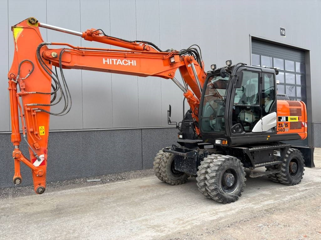 Hitachi ZX 140 W-5B - Колёсный экскаватор: фото 2 Hitachi ZX 140 W-5B - Колёсный экскаватор: фото 2