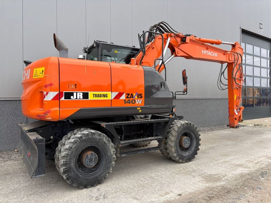 Hitachi ZX 140 W-5B - Колёсный экскаватор: фото 5 Hitachi ZX 140 W-5B - Колёсный экскаватор: фото 5
