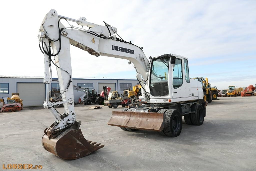 Liebherr A 316 Litronic - Колёсный экскаватор: фото 1 Liebherr A 316 Litronic - Колёсный экскаватор: фото 1