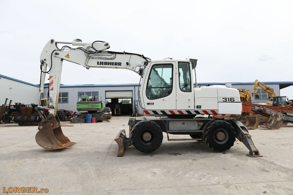 Liebherr A 316 Litronic - Колёсный экскаватор: фото 4 Liebherr A 316 Litronic - Колёсный экскаватор: фото 4