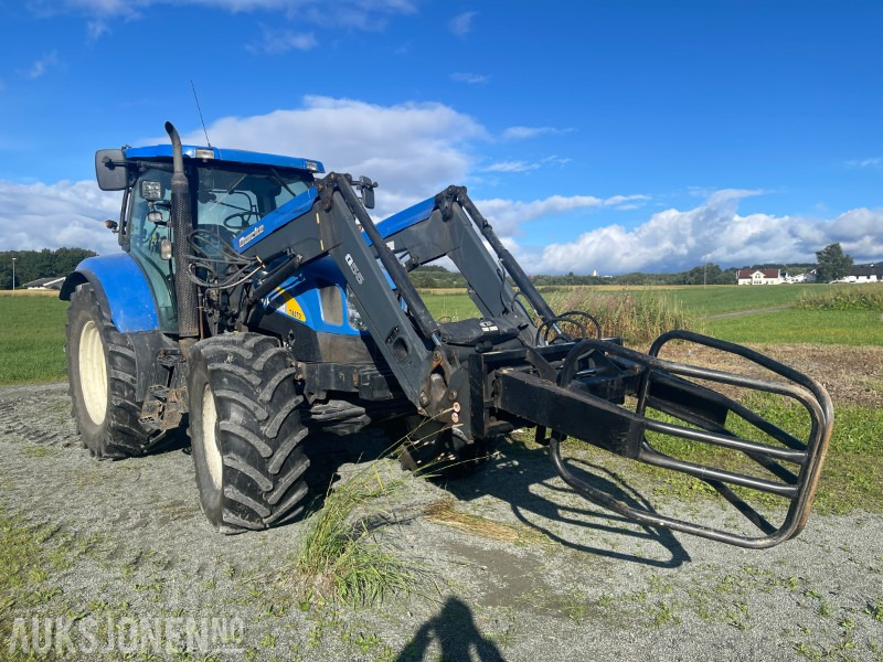 2009 New Holland T6070 - med frontlaster - Трактор: фото 2 2009 New Holland T6070 - med frontlaster - Трактор: фото 2