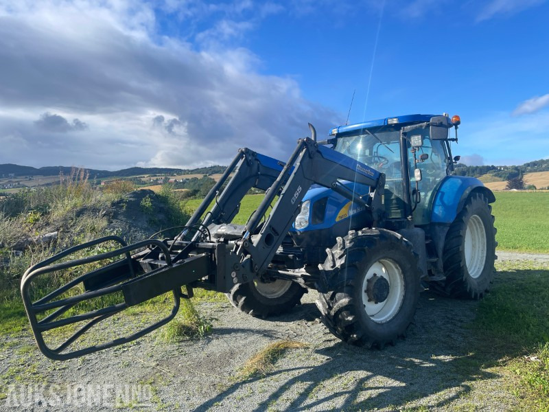 2009 New Holland T6070 - med frontlaster - Трактор: фото 1 2009 New Holland T6070 - med frontlaster - Трактор: фото 1