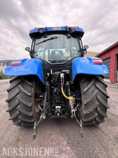 2012 New Holland T6050 med Trima +4.1P frontlaster og panser beskytter - 40 km/t - Трактор: фото 5 2012 New Holland T6050 med Trima +4.1P frontlaster og panser beskytter - 40 km/t - Трактор: фото 5