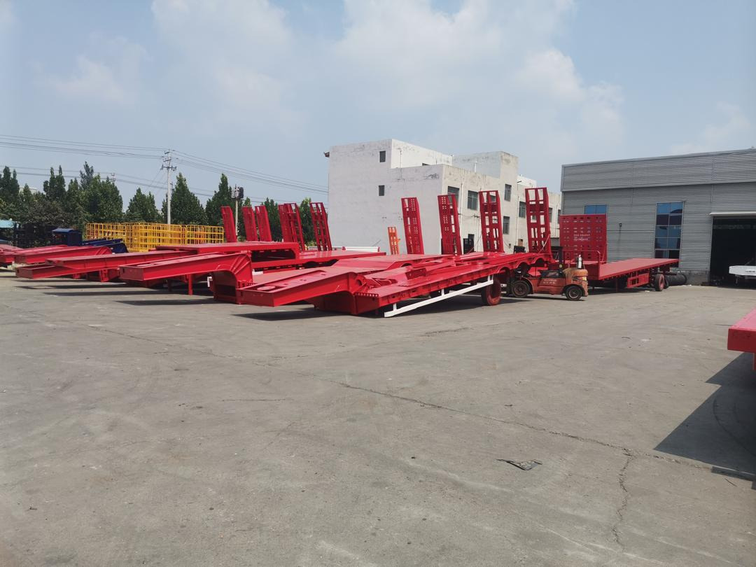 ZHICHENG Semni Flat Bed Low Bed Floater with 3 Axles 4 Axles New or Used 12M 13.75M In High Quality - Низкорамный полуприцеп: фото 5 ZHICHENG Semni Flat Bed Low Bed Floater with 3 Axles 4 Axles New or Used 12M 13.75M In High Quality - Низкорамный полуприцеп: фото 5