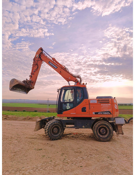 Doosan DX140W-3 *coming soon* - Колёсный экскаватор: фото 1 Doosan DX140W-3 *coming soon* - Колёсный экскаватор: фото 1