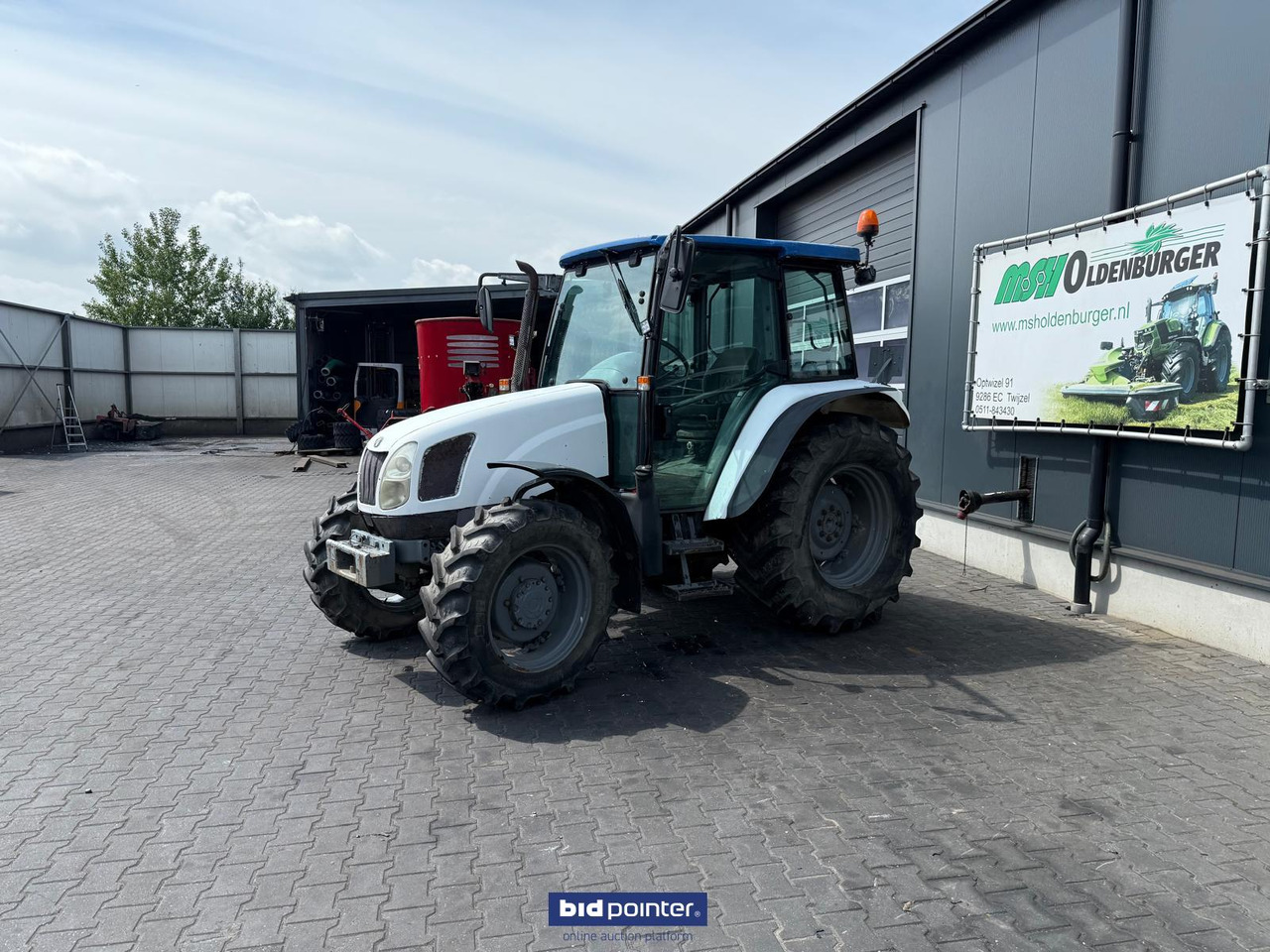 New Holland TL 70A - Трактор: фото 2 New Holland TL 70A - Трактор: фото 2