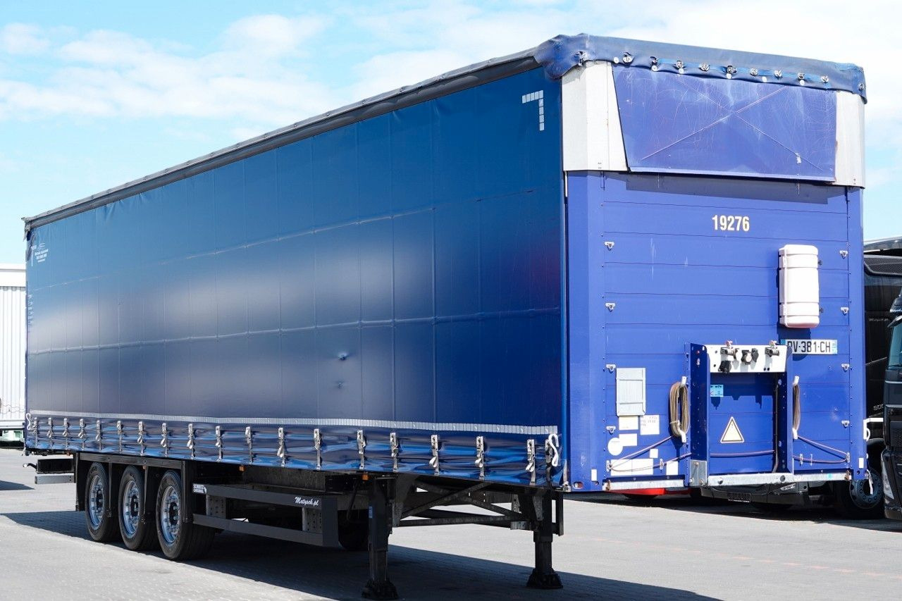 Schmitz Cargobull FIRANKA VARIOS / PODNOSZONY DACH / OPONY 385/55 - Тентованный полуприцеп: фото 4 Schmitz Cargobull FIRANKA VARIOS / PODNOSZONY DACH / OPONY 385/55 - Тентованный полуприцеп: фото 4