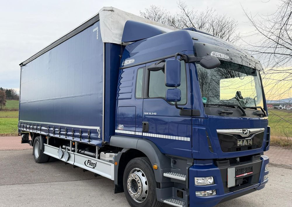 MAN TGM 18.340 / FIRANKA / LIFT / SPROWADZONY / KLIMA POSTOJOWA / 2017 / 9700 ŁADOWNOŚĆ / AUTOMAT / 18 PALET / E6 / WINDA / - Тентованный грузовик: фото 1 MAN TGM 18.340 / FIRANKA / LIFT / SPROWADZONY / KLIMA POSTOJOWA / 2017 / 9700 ŁADOWNOŚĆ / AUTOMAT / 18 PALET / E6 / WINDA / - Тентованный грузовик: фото 1
