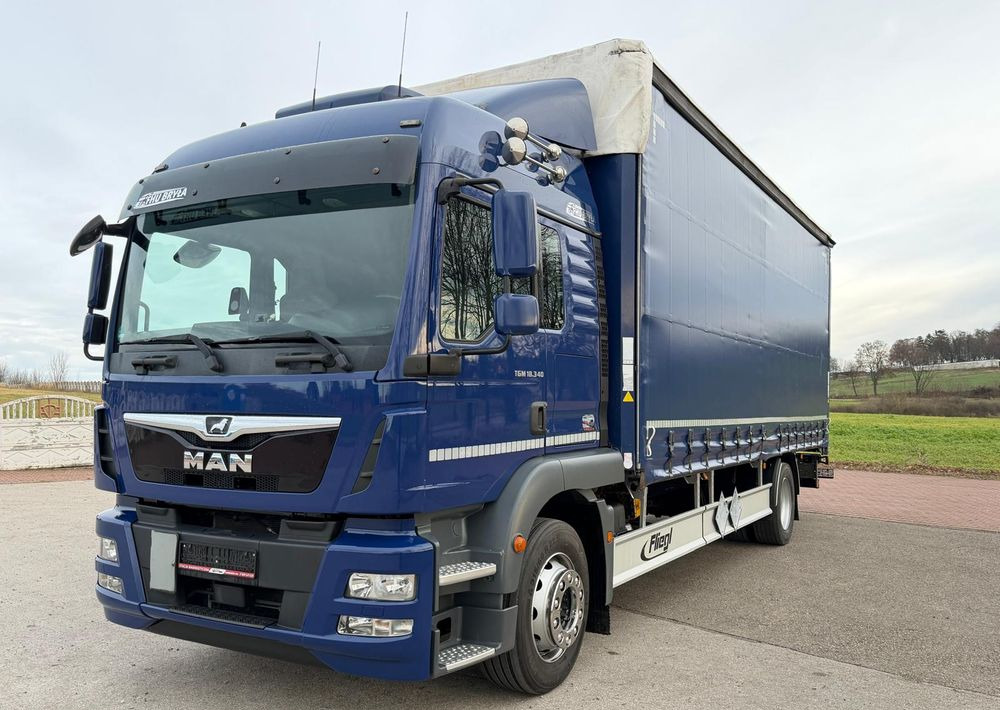 MAN TGM 18.340 / FIRANKA / LIFT / SPROWADZONY / KLIMA POSTOJOWA / 2017 / 9700 ŁADOWNOŚĆ / AUTOMAT / 18 PALET / E6 / WINDA / - Тентованный грузовик: фото 2 MAN TGM 18.340 / FIRANKA / LIFT / SPROWADZONY / KLIMA POSTOJOWA / 2017 / 9700 ŁADOWNOŚĆ / AUTOMAT / 18 PALET / E6 / WINDA / - Тентованный грузовик: фото 2