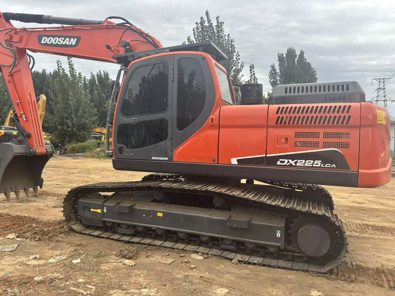 DOOSAN DX225LCA - Гусеничный экскаватор: фото 1 DOOSAN DX225LCA - Гусеничный экскаватор: фото 1