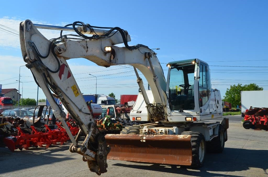 Case WX 145 - Колёсный экскаватор: фото 2 Case WX 145 - Колёсный экскаватор: фото 2