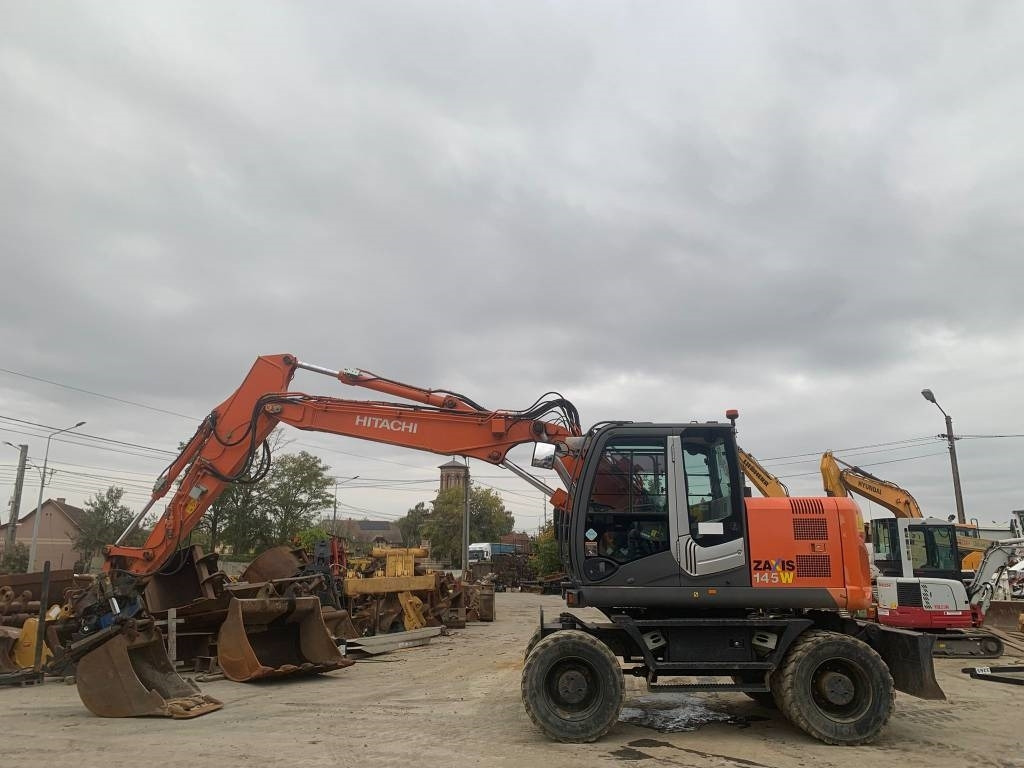 Hitachi ZX 145 W-3+SMP Rototilt  - Колёсный экскаватор: фото 2 Hitachi ZX 145 W-3+SMP Rototilt  - Колёсный экскаватор: фото 2