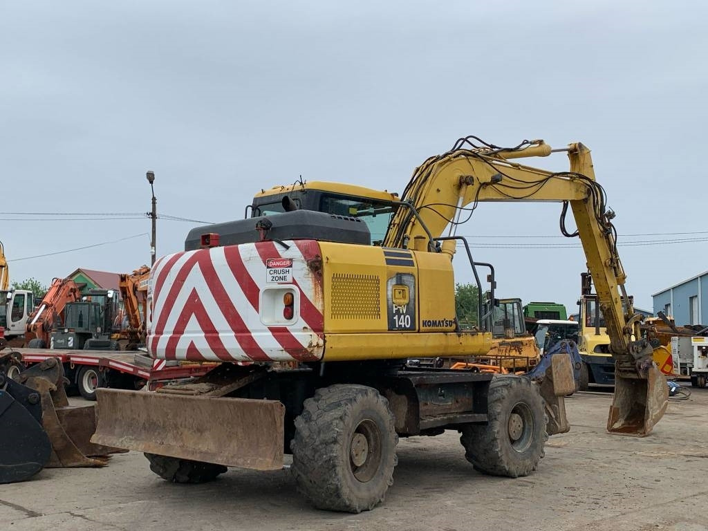 Колёсный экскаватор Komatsu PW 140-7: фото 7