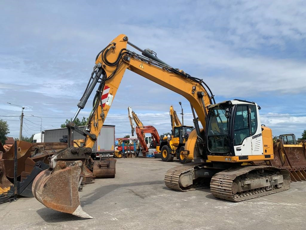 Liebherr R 914 Compact Litronic - Колёсный экскаватор: фото 1 Liebherr R 914 Compact Litronic - Колёсный экскаватор: фото 1