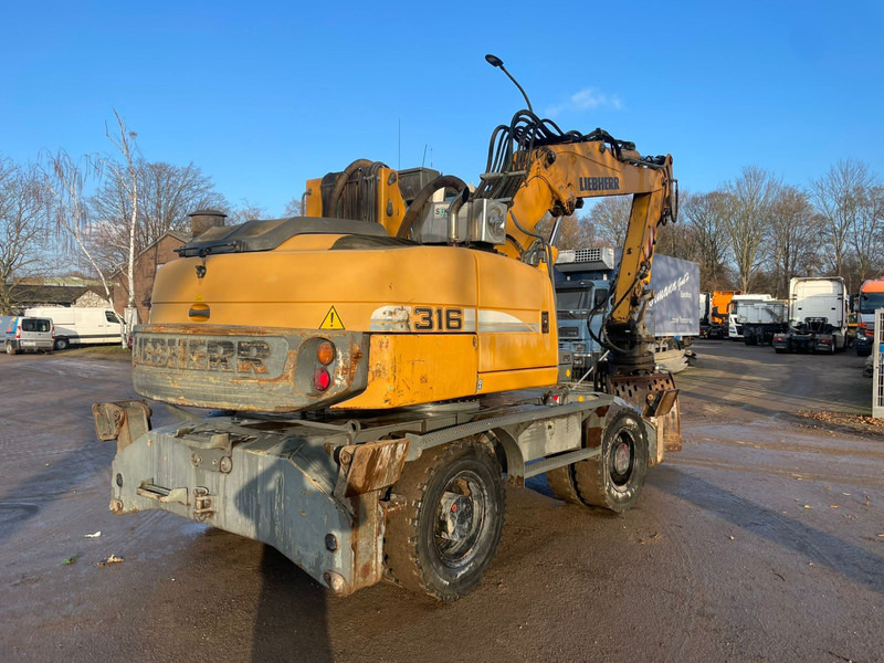 Liebherr A 316 - Перегружатель: фото 3 Liebherr A 316 - Перегружатель: фото 3