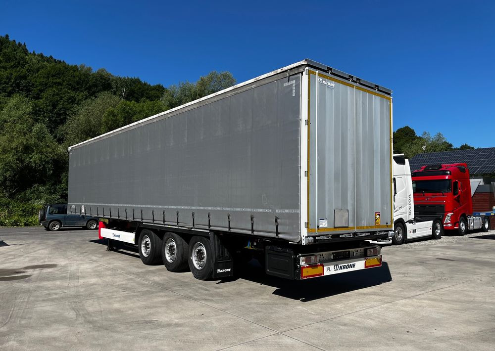 Krone Firanka Coilmulde // 9m // Alu Drzwi // Ażury // Oś podnoszona // - Тентованный полуприцеп: фото 3 Krone Firanka Coilmulde // 9m // Alu Drzwi // Ażury // Oś podnoszona // - Тентованный полуприцеп: фото 3
