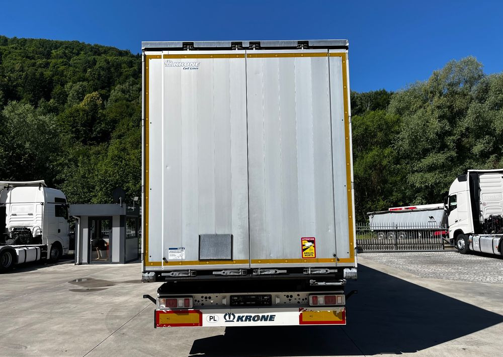 Krone Firanka Coilmulde // 9m // Alu Drzwi // Ażury // Oś podnoszona // - Тентованный полуприцеп: фото 2 Krone Firanka Coilmulde // 9m // Alu Drzwi // Ażury // Oś podnoszona // - Тентованный полуприцеп: фото 2
