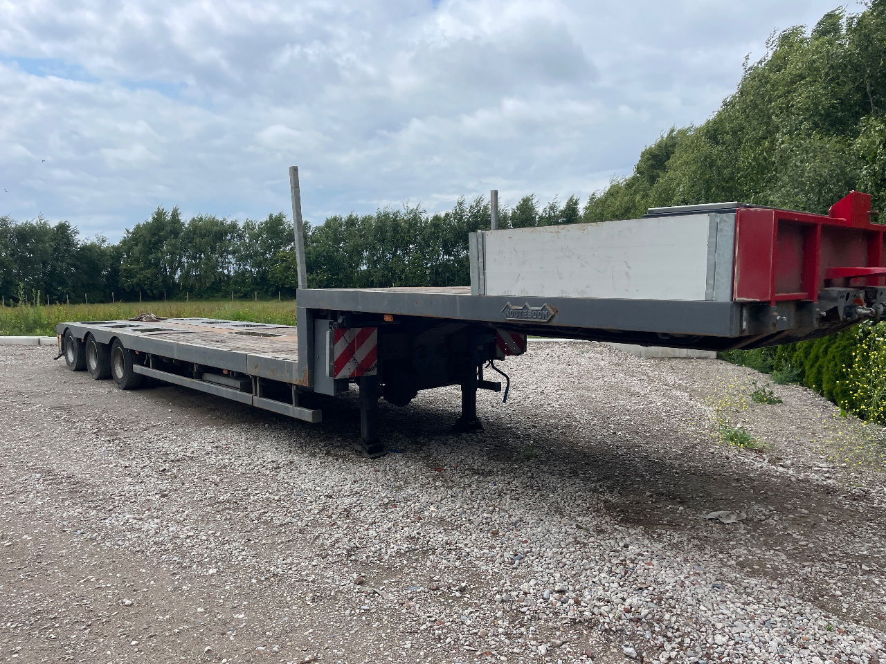 Nooteboom Mco-48-03 V uitschuifbaar hydrolisch gestuurd semi dieplader - Низкорамный полуприцеп: фото 1 Nooteboom Mco-48-03 V uitschuifbaar hydrolisch gestuurd semi dieplader - Низкорамный полуприцеп: фото 1