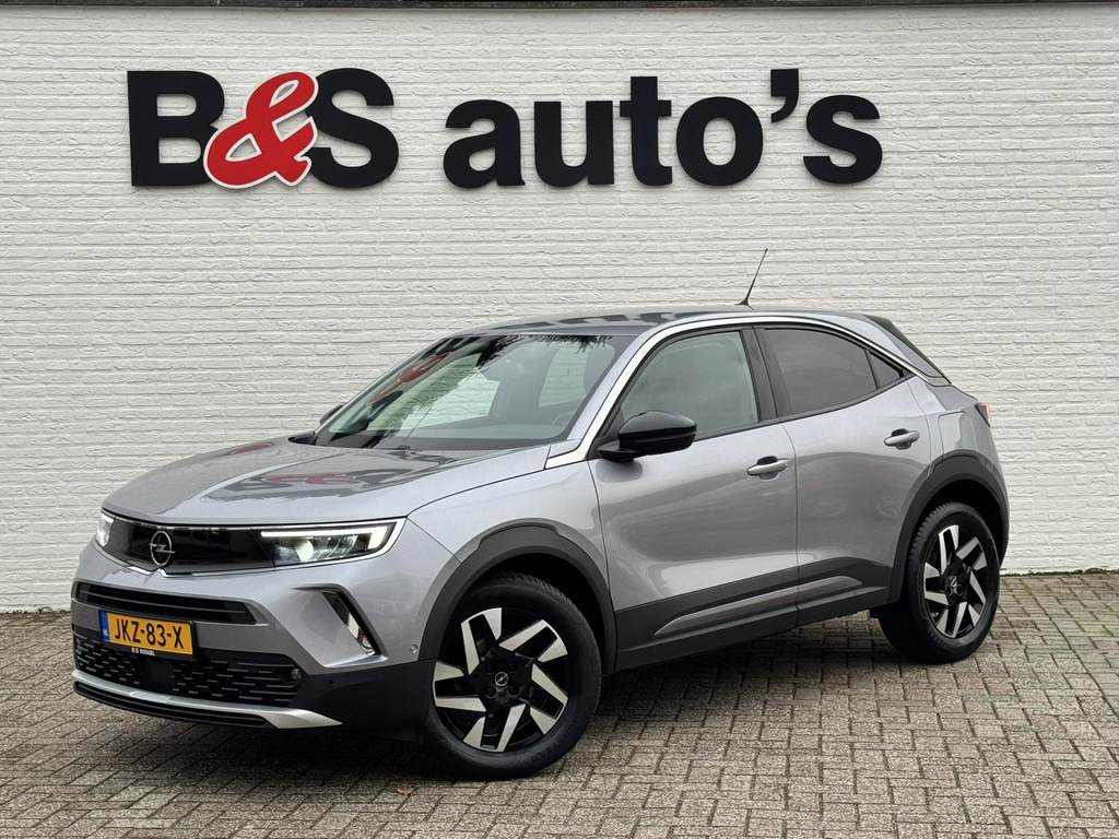 Opel Mokka-1.2 Turbo Elegance Cruise control Climate control Stoel- stuurverwarming Apple / Android Parkeersensoren plus camera - Внедорожник: фото 1 Opel Mokka-1.2 Turbo Elegance Cruise control Climate control Stoel- stuurverwarming Apple / Android Parkeersensoren plus camera - Внедорожник: фото 1