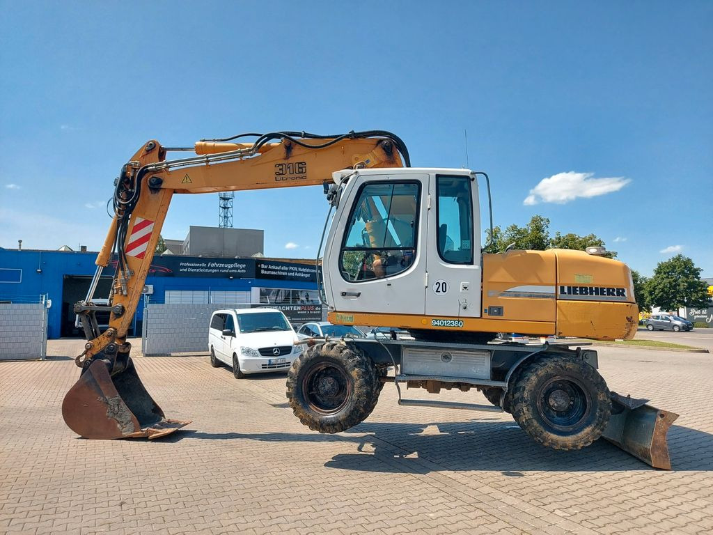 Liebherr A 316 LITRONIC TL + 2005 DEUTZ 13400 STD. - Колёсный экскаватор: фото 2 Liebherr A 316 LITRONIC TL + 2005 DEUTZ 13400 STD. - Колёсный экскаватор: фото 2