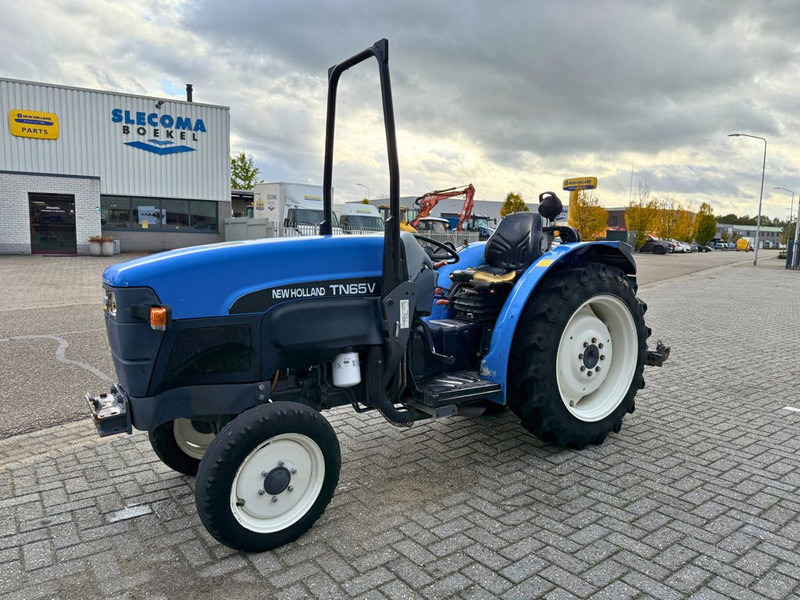 New Holland TN65V Smalspoortrekker - Трактор: фото 1 New Holland TN65V Smalspoortrekker - Трактор: фото 1