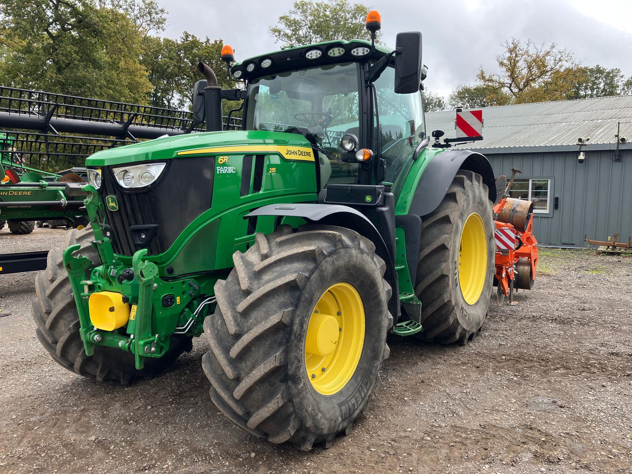 John Deere 6R 215 - Трактор: фото 1 John Deere 6R 215 - Трактор: фото 1