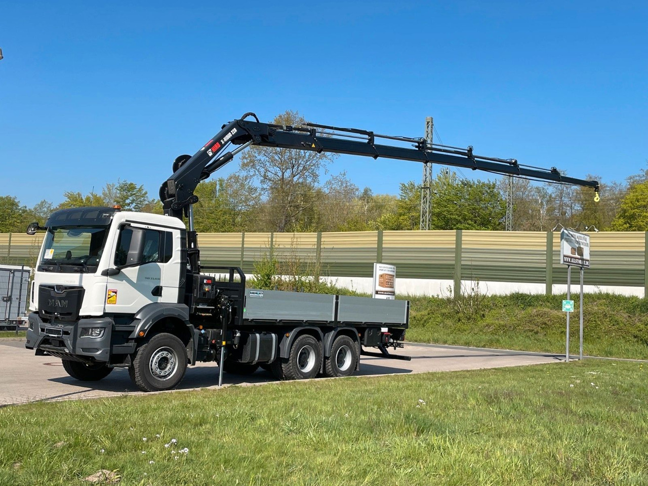 MAN TGS 33.440 6x4 HIAB 228-6 - Грузовик бортовой/ Платформа, Автоманипулятор: фото 1 MAN TGS 33.440 6x4 HIAB 228-6 - Грузовик бортовой/ Платформа, Автоманипулятор: фото 1