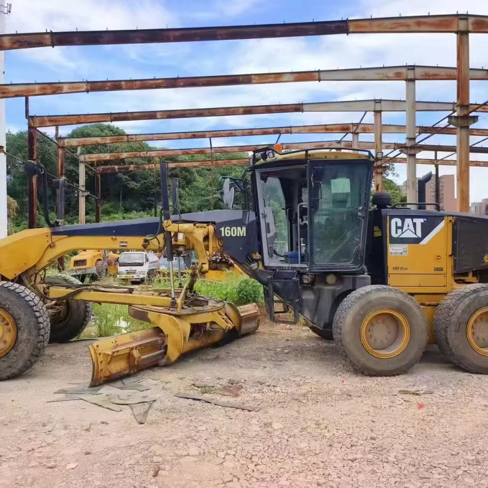 Original CAT 160M Grader Used Caterpillar Brand CAT 140H 140K 160K 120H 14G Motor Grader High Quality - Грейдер: фото 1 Original CAT 160M Grader Used Caterpillar Brand CAT 140H 140K 160K 120H 14G Motor Grader High Quality - Грейдер: фото 1