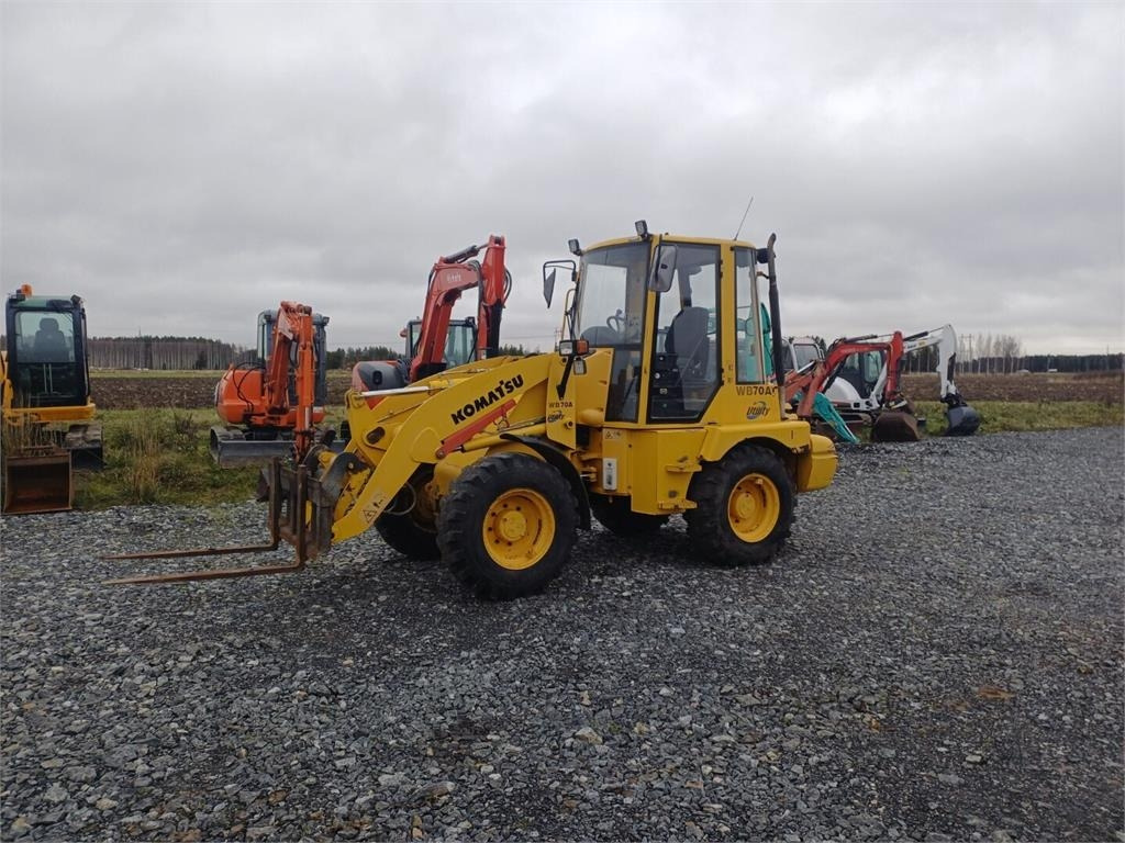 Komatsu WB70A Pyöräkuormaaja - Колёсный погрузчик: фото 1 Komatsu WB70A Pyöräkuormaaja - Колёсный погрузчик: фото 1